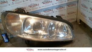 O73443 Gebruikte koplamp rechts Opel Omega