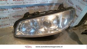 O71990 Gebruikte koplamp links Opel Omega