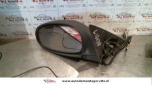 O84825 Gebruikte spiegel buiten links Chrysler Neon