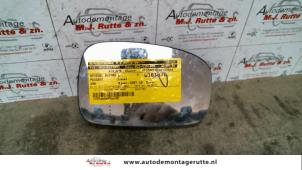 O86166 Gebruikte spiegelglas links Peugeot 306