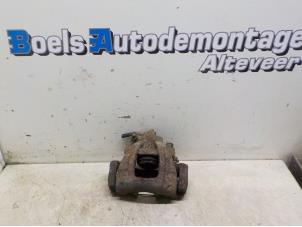 Gebruikte Remklauw (Tang) rechts-voor BMW Mini One/Cooper (R50) 1.6 16V Cooper Prijs € 35,00 Margeregeling aangeboden door Boels Autodemontage