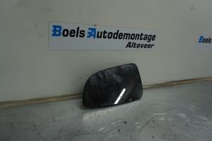 Gebruikte Spiegelglas links Opel Astra H (L48) 1.4 16V Twinport Prijs € 20,00 Margeregeling aangeboden door Boels Autodemontage