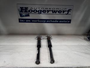 Gebruikte Schokdemper set Opel Corsa D 1.2 16V Prijs € 40,00 Margeregeling aangeboden door Autobedrijf Hoogerwerf