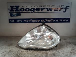 Gebruikte Rechter Koplamp Renault Modus/Grand Modus (JP) 1.2 16V Prijs € 50,00 Margeregeling aangeboden door Autobedrijf Hoogerwerf