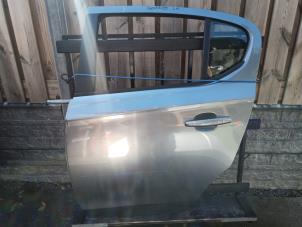 Gebruikte Deur 4Deurs links-achter Opel Corsa E 1.0 SIDI Turbo 12V Prijs € 125,00 Margeregeling aangeboden door Autobedrijf Hoogerwerf