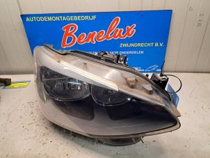 Gebruikte Rechter Koplamp BMW 1 serie (F20) 120i 1.6 16V Prijs € 225,00 Margeregeling aangeboden door Benelux Zwijndrecht B.V.