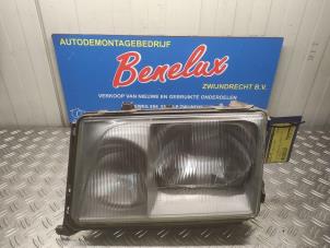 Gebruikte Linker Koplamp Mercedes 200 - 500 Prijs op aanvraag aangeboden door Benelux Zwijndrecht B.V.
