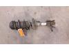 Opel Corsa D 1.2 16V Mac Phersonpoot links-voor