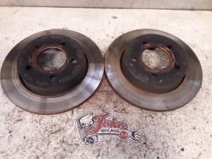 Gebruikte Remschijf achter Mazda 3 Sport (BK) 1.3i 16V Prijs op aanvraag aangeboden door Autodemontage Joko B.V.