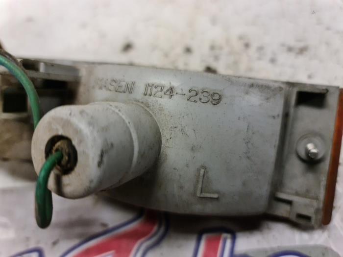 Richtingaanwijzer links van een Mitsubishi Colt (C1) 1.6 Turbo 1984