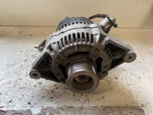 Gebruikte Alternator Opel Corsa B (73/78/79) 1.4i Prijs op aanvraag aangeboden door Autodemontage Joko B.V.
