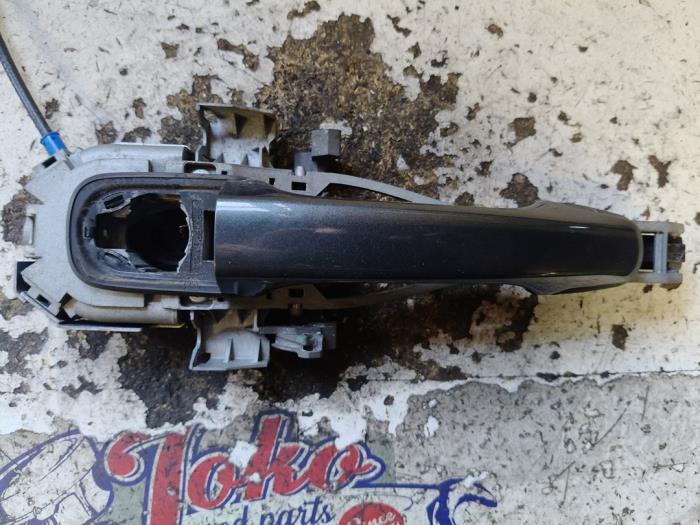 Portiergreep 2Deurs links van een Volvo C30 (EK/MK) 1.6 D 16V 2009