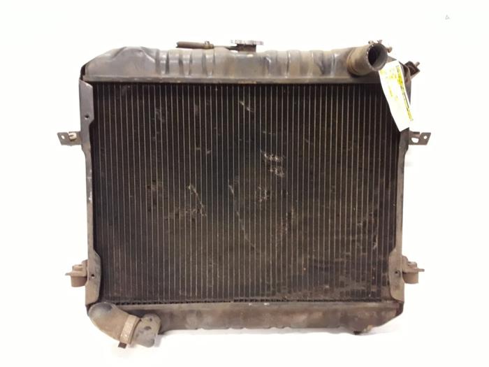 Gebruikte Radiateur Nissan Cabstar (F22) 2.5 D Prijs op aanvraag aangeboden door Autodemontage Joko B.V.