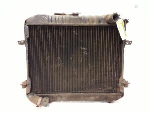 Gebruikte Radiateur Nissan Cabstar (F22) 2.5 D Prijs op aanvraag aangeboden door Autodemontage Joko B.V.