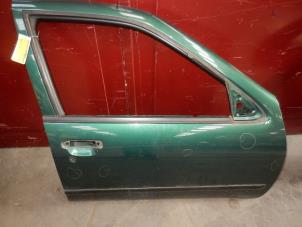 Gebruikte Portier 4Deurs rechts-voor Nissan Almera (N15) 1.4 LX,GX,S 16V Prijs op aanvraag aangeboden door Autodemontage Joko B.V.