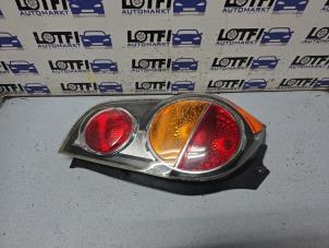 Gebruikte Achterlicht links Chevrolet Spark (M300) 1.0 16V Bifuel Prijs € 35,00 Margeregeling aangeboden door Automarkt Lotfi