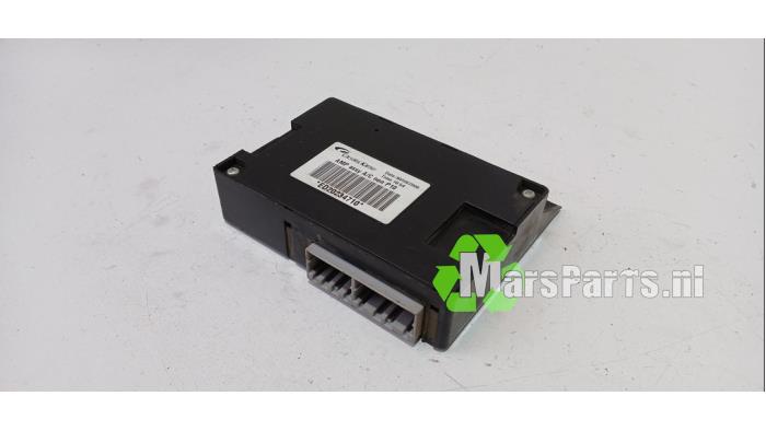 Computer Koeling van een Nissan Primera Wagon (W12) 1.8 16V 2006