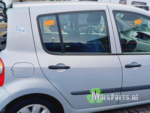 Gebruikte Portier 4Deurs rechts-achter Renault Modus/Grand Modus (JP) 1.6 16V Prijs € 100,00 Margeregeling aangeboden door Autodemontagebedrijf De Mars