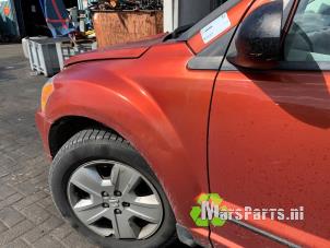 Gebruikte Scherm links-voor Dodge Caliber 1.8 16V Prijs € 50,00 Margeregeling aangeboden door Autodemontagebedrijf De Mars