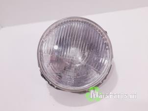 Gebruikte Linker Koplamp Mercedes G (460) 240 GD Prijs op aanvraag aangeboden door Autodemontagebedrijf De Mars