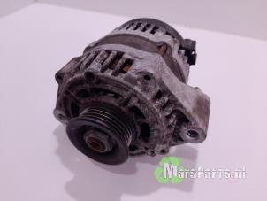 Gebruikte Dynamo Chevrolet Spark (M300) 1.0 16V Bifuel Prijs € 25,00 Margeregeling aangeboden door Autodemontagebedrijf De Mars