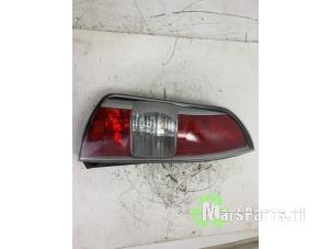 Gebruikte Achterlicht links Daihatsu Sirion 2 (M3) 1.0 12V DVVT Prijs € 35,00 Margeregeling aangeboden door Autodemontagebedrijf De Mars