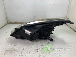 Gebruikte Koplamp rechts Opel Corsa D 1.0 Prijs € 60,00 Margeregeling aangeboden door Autodemontagebedrijf De Mars