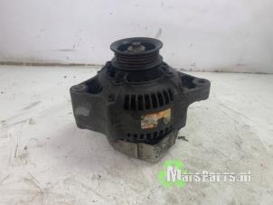 Gebruikte Dynamo Toyota Starlet (EP8/NP8) 1.3 Friend,XLi 12V Prijs € 60,00 Margeregeling aangeboden door Autodemontagebedrijf De Mars