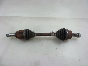 Gebruikte Aandrijfas links-voor Opel Combo 1.3 CDTI 16V Prijs € 60,50 Inclusief btw aangeboden door Autobedrijf Broekhuis B.V.