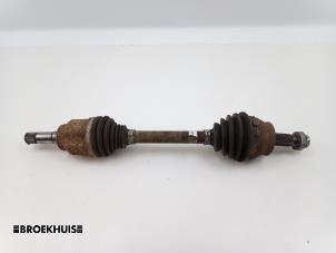 Gebruikte Aandrijfas links-voor Opel Combo 1.3 CDTI 16V Prijs € 48,40 Inclusief btw aangeboden door Autobedrijf Broekhuis B.V.