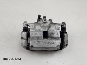 Gebruikte Remklauw (Tang) rechts-voor Mazda CX-30 (DM) 2.0 e-SkyActiv X 186 M Hybrid 16V Prijs € 100,00 Margeregeling aangeboden door Autobedrijf Broekhuis B.V.