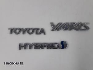 Gebruikte Embleem Toyota Yaris III (P13) 1.5 16V Hybrid Prijs € 10,00 Margeregeling aangeboden door Autobedrijf Broekhuis B.V.