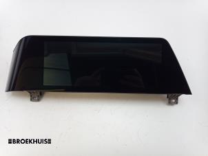 Gebruikte Display Multi Media regelunit BMW 3 serie Touring (G21) 330e xDrive 2.0 TwinPower Turbo 16V Prijs € 850,00 Margeregeling aangeboden door Autobedrijf Broekhuis B.V.