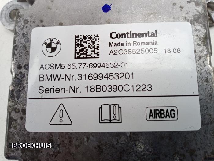 Airbag Module van een BMW 5 serie (G30) 530e iPerformance 2018