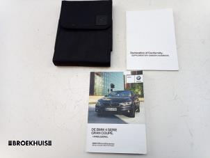 Gebruikte Instructie Boekje BMW 4 serie Gran Coupe (F36) 420i 2.0 TwinPower Turbo 16V Prijs € 40,00 Margeregeling aangeboden door Autobedrijf Broekhuis B.V.