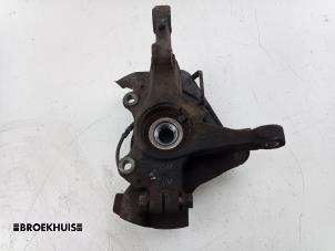 Gebruikte Asschenkel rechts-voor Opel Corsa D 1.4 16V Twinport Prijs € 30,00 Margeregeling aangeboden door Autobedrijf Broekhuis B.V.