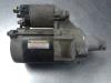 Startmotor van een Daihatsu Sirion/Storia (M1) 1.0 12V 1999