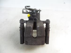 Gebruikte Remklauw (Tang) links-achter Renault Megane III Grandtour (KZ) 1.5 dCi 110 Prijs € 20,00 Margeregeling aangeboden door Autobedrijf Broekhuis B.V.