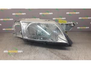 Gebruikte Koplamp rechts Mazda Premacy 1.8 16V Prijs € 15,00 Margeregeling aangeboden door Autorecycling Joure B.V.