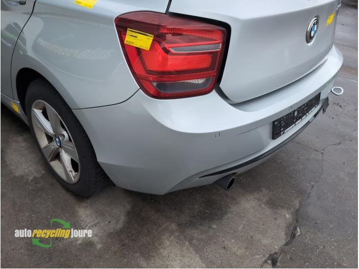 Achterbumper van een BMW 1 serie (F20) 116i 1.6 16V 2013