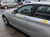 Portier 4Deurs links-voor van een BMW 1 serie (F20) 116i 1.6 16V 2013