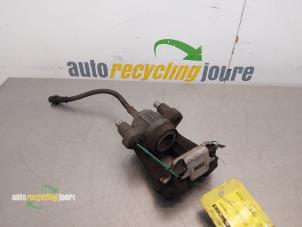 Gebruikte Remklauw (Tang) links-achter BMW 1 serie (F20) 116i 1.6 16V Prijs € 24,99 Margeregeling aangeboden door Autorecycling Joure B.V.