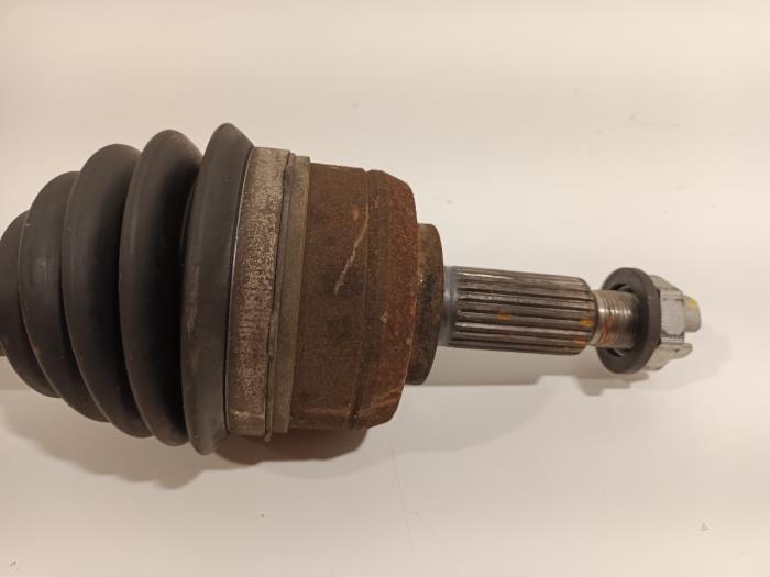 Aandrijfas links-voor van een Dacia Dokker 2016