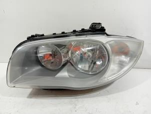 Gebruikte Linker Koplamp BMW 1-Serie Prijs € 69,00 Margeregeling aangeboden door Van der Ven Autorecycling B.V.