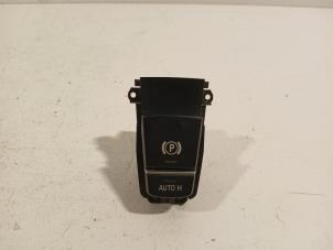 Gebruikte Handrem schakelaar BMW 6-Serie Prijs € 26,00 Margeregeling aangeboden door Van der Ven Autorecycling B.V.