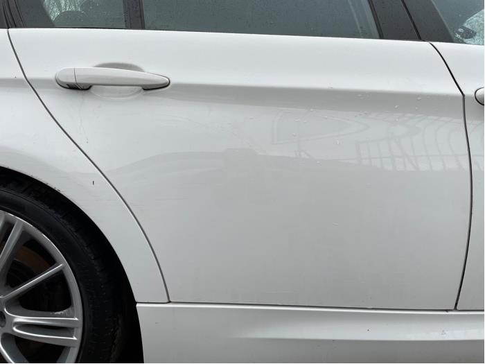 Portier 4Deurs rechts-achter van een BMW 3 serie (E90) 320d 16V Corporate Lease 2011