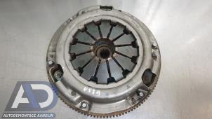 Gebruikte Vliegwiel Mitsubishi Space Star (A0) 1.0 12V Prijs € 124,99 Margeregeling aangeboden door Autodemontage Aandijk