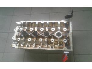 Gebruikte Cilinderkop Opel Astra H GTC (L08) 1.6 16V Prijs op aanvraag aangeboden door Wessel Parts & Service B.V.