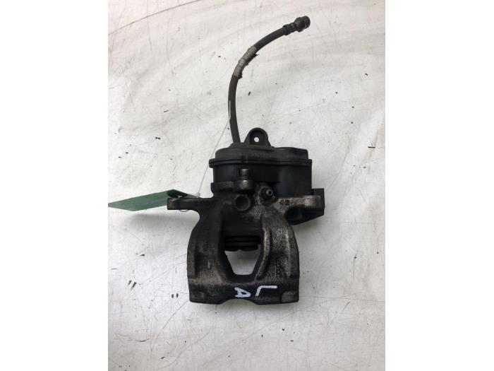 Rear brake calliper, left - 551a1c4f-a7ed-41c5-a5a4-3a1430e597f8.jpg