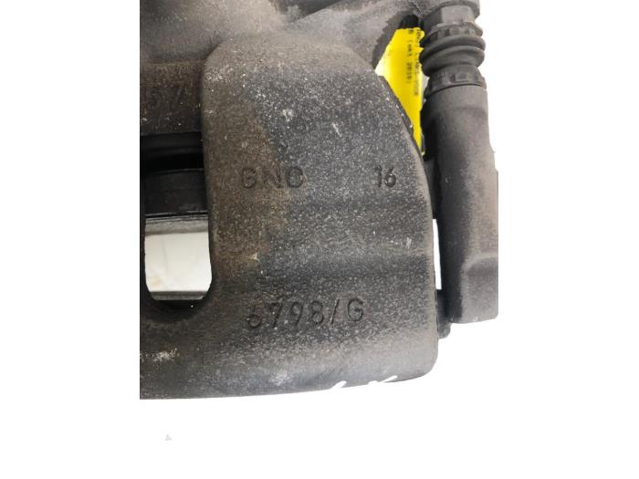 Front brake calliper, left - a7356f71-10a5-4e19-8701-5f4a46ffa344.jpg